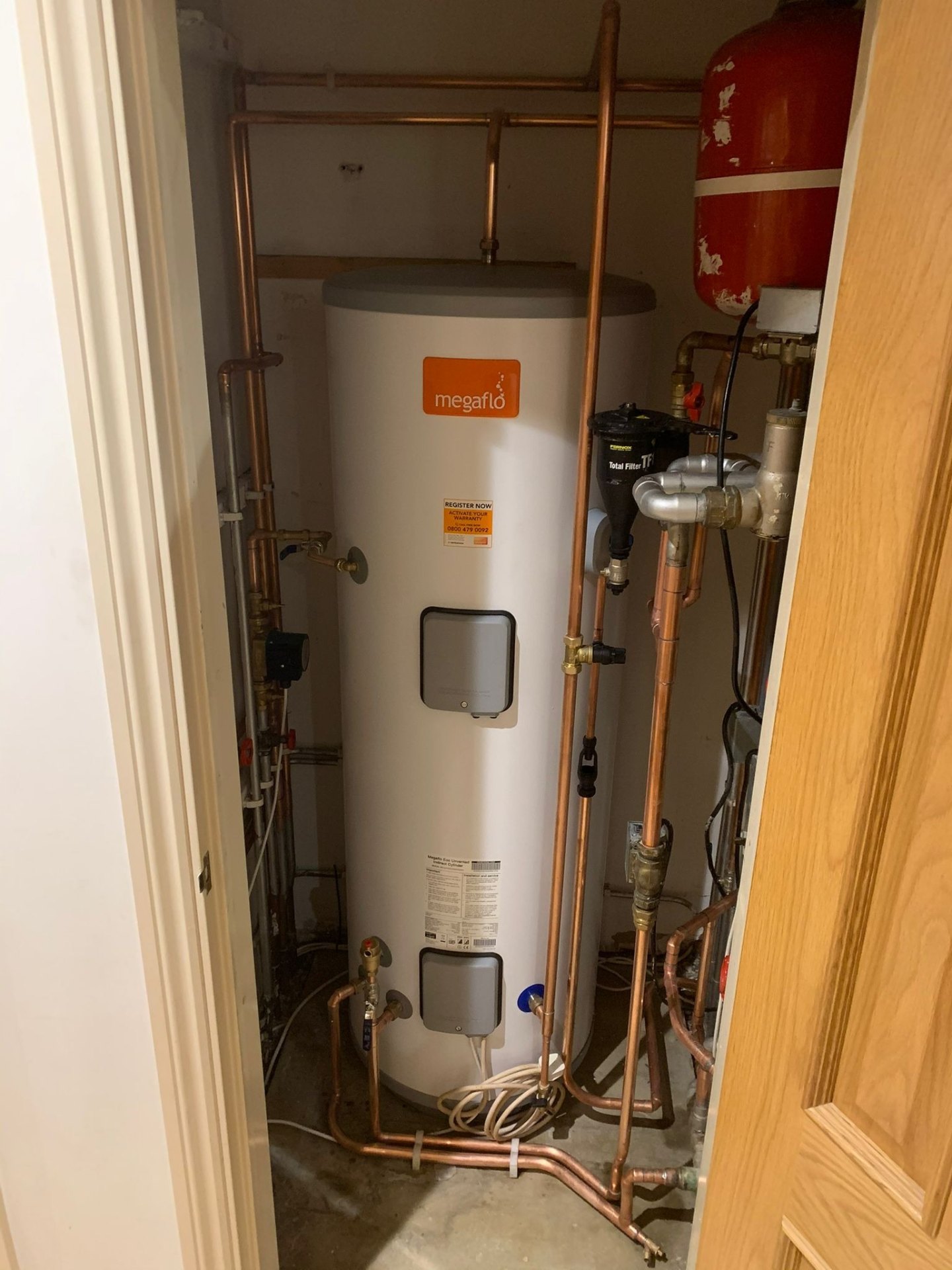 Megaflo unvented cylinder installed with expansion vessel and magnetic filter in Surrey