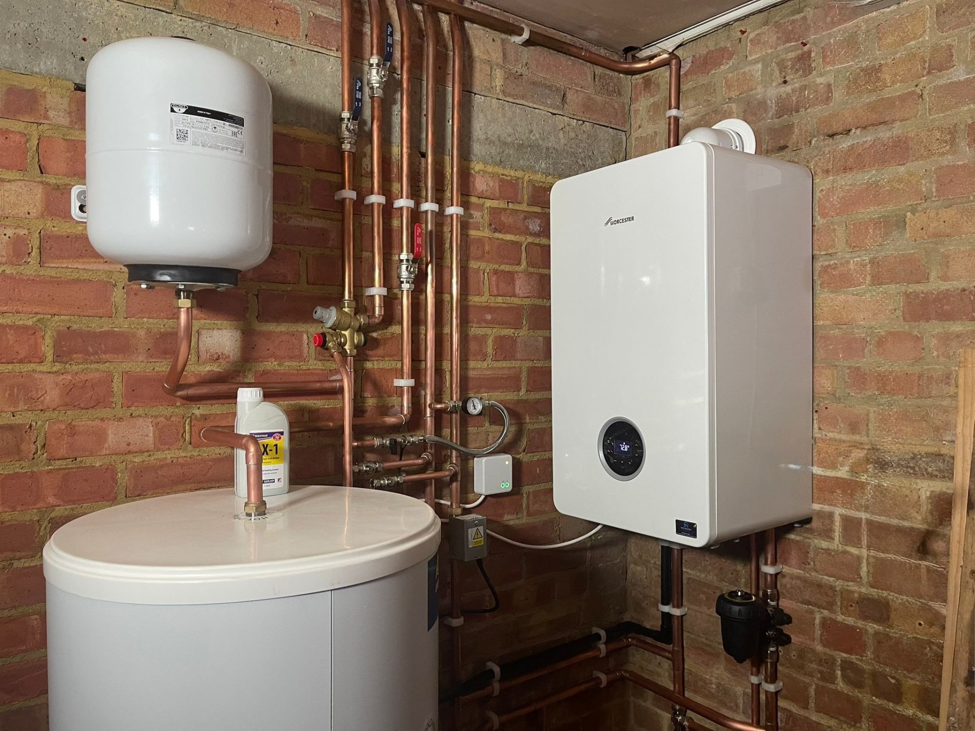 Vaillant boiler and hot water cylinder installation in a Surrey home